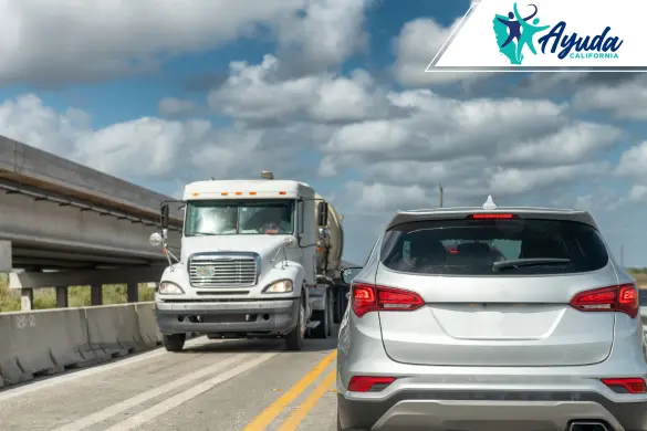 crash between a sedan and a truck